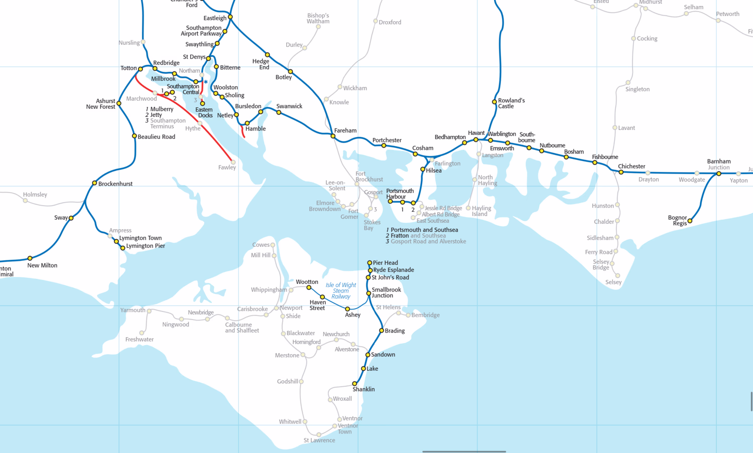 The New Adlestrop Railway Atlas showing South Hampshire and the Isle of Wight. Former routes are shown in a faded grey, while modern ones are dark, heritage in a thinner lighter blue, and freight-only in red. Station names are clearly labelled with yellow dots. The Isle of Wight for example used to have 5 main routes, of which only one is now National Rail, with another being heritage for part of it.